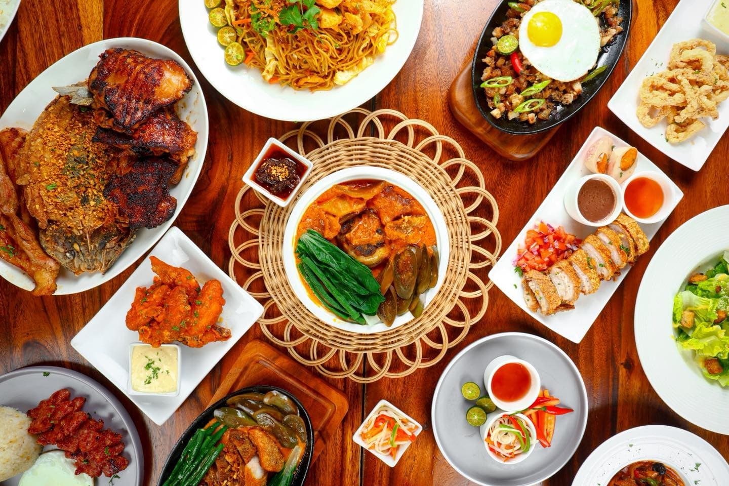 A spread of Lula's signature dishes set out for sharing